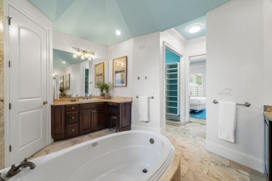 This exquisite custom home, nestled in the secure and golf on Regatta Bay Golf and Country Club in Florida - for sale on GolfHomes.com, golf home, golf lot