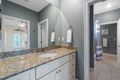 This exquisite custom home, nestled in the secure and golf on Regatta Bay Golf and Country Club in Florida - for sale on GolfHomes.com, golf home, golf lot