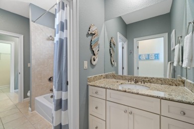 This exquisite custom home, nestled in the secure and golf on Regatta Bay Golf and Country Club in Florida - for sale on GolfHomes.com, golf home, golf lot