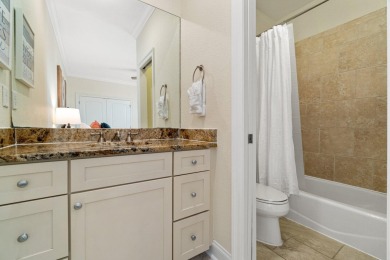 This exquisite custom home, nestled in the secure and golf on Regatta Bay Golf and Country Club in Florida - for sale on GolfHomes.com, golf home, golf lot