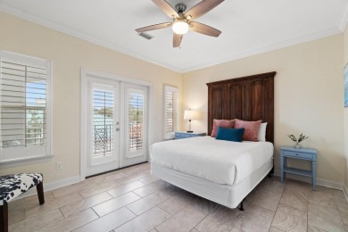 This exquisite custom home, nestled in the secure and golf on Regatta Bay Golf and Country Club in Florida - for sale on GolfHomes.com, golf home, golf lot