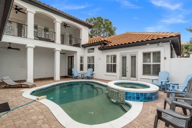 This exquisite custom home, nestled in the secure and golf on Regatta Bay Golf and Country Club in Florida - for sale on GolfHomes.com, golf home, golf lot