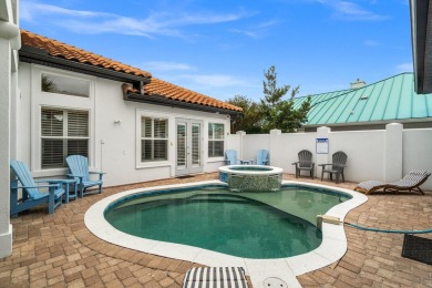 This exquisite custom home, nestled in the secure and golf on Regatta Bay Golf and Country Club in Florida - for sale on GolfHomes.com, golf home, golf lot
