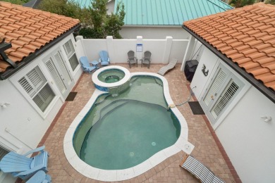 This exquisite custom home, nestled in the secure and golf on Regatta Bay Golf and Country Club in Florida - for sale on GolfHomes.com, golf home, golf lot