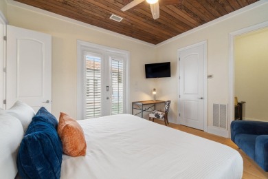 This exquisite custom home, nestled in the secure and golf on Regatta Bay Golf and Country Club in Florida - for sale on GolfHomes.com, golf home, golf lot