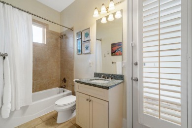 This exquisite custom home, nestled in the secure and golf on Regatta Bay Golf and Country Club in Florida - for sale on GolfHomes.com, golf home, golf lot