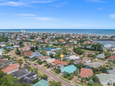 This exquisite custom home, nestled in the secure and golf on Regatta Bay Golf and Country Club in Florida - for sale on GolfHomes.com, golf home, golf lot