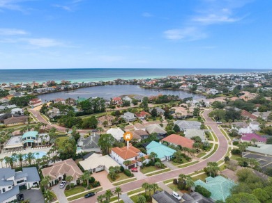 This exquisite custom home, nestled in the secure and golf on Regatta Bay Golf and Country Club in Florida - for sale on GolfHomes.com, golf home, golf lot