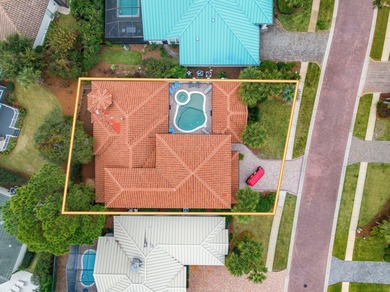 This exquisite custom home, nestled in the secure and golf on Regatta Bay Golf and Country Club in Florida - for sale on GolfHomes.com, golf home, golf lot