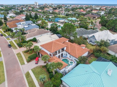 This exquisite custom home, nestled in the secure and golf on Regatta Bay Golf and Country Club in Florida - for sale on GolfHomes.com, golf home, golf lot