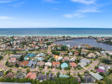 This exquisite custom home, nestled in the secure and golf on Regatta Bay Golf and Country Club in Florida - for sale on GolfHomes.com, golf home, golf lot