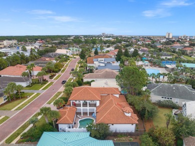This exquisite custom home, nestled in the secure and golf on Regatta Bay Golf and Country Club in Florida - for sale on GolfHomes.com, golf home, golf lot