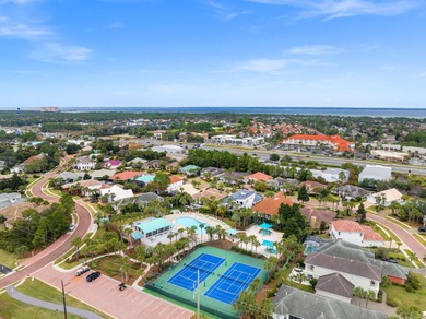This exquisite custom home, nestled in the secure and golf on Regatta Bay Golf and Country Club in Florida - for sale on GolfHomes.com, golf home, golf lot