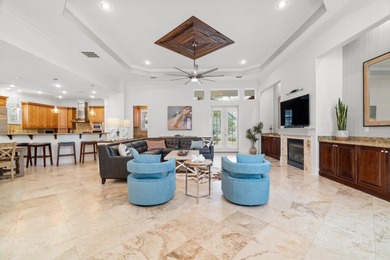 This exquisite custom home, nestled in the secure and golf on Regatta Bay Golf and Country Club in Florida - for sale on GolfHomes.com, golf home, golf lot
