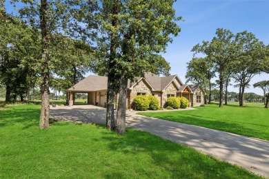 This magazine worthy residence is nestled on almost a half acre on Cedar Creek Country Club in Texas - for sale on GolfHomes.com, golf home, golf lot