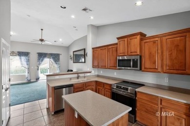 Welcome home to this inviting single-level residence located in on The Oasis Golf Club in Nevada - for sale on GolfHomes.com, golf home, golf lot