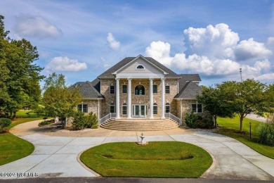 Welcome to your coastal dream retreat in Hertford, North on Sound Golf Links at Albemarle Plantation in North Carolina - for sale on GolfHomes.com, golf home, golf lot