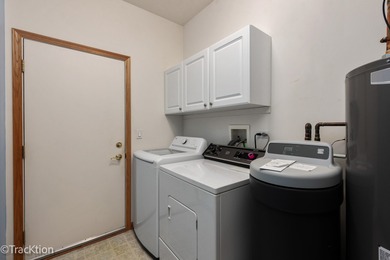 Thia home is light. bright. cozy and comfortable! A Whitney on Carillon Lakes 3 Hole Course in Illinois - for sale on GolfHomes.com, golf home, golf lot