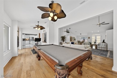 This stunning 3-bedroom, 3-bath residence den or bonus room on Fiddlesticks Country Club in Florida - for sale on GolfHomes.com, golf home, golf lot