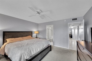 BEAUTIFUL 2 BEDROOM 2 BATH WITH MAGNIFICENT LAKE AND FOUNTAIN on Wynmoor Golf Course in Florida - for sale on GolfHomes.com, golf home, golf lot