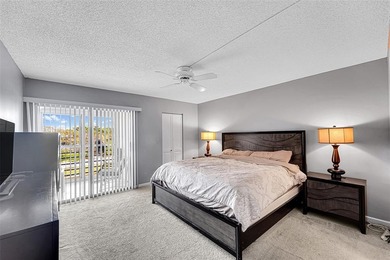 BEAUTIFUL 2 BEDROOM 2 BATH WITH MAGNIFICENT LAKE AND FOUNTAIN on Wynmoor Golf Course in Florida - for sale on GolfHomes.com, golf home, golf lot