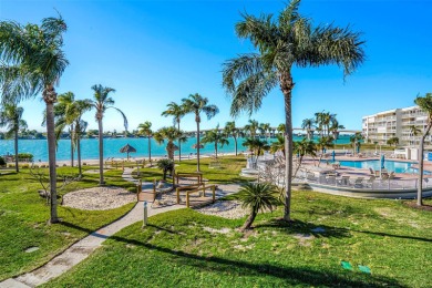 Welcome to your slice of paradise at 6061 Bahia Del Mar, where on Isla Del Sol Yacht and Country Club in Florida - for sale on GolfHomes.com, golf home, golf lot