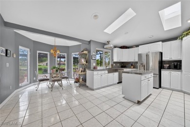 This stunning 3-bedroom, 3-bath residence den or bonus room on Fiddlesticks Country Club in Florida - for sale on GolfHomes.com, golf home, golf lot