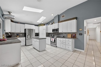 This stunning 3-bedroom, 3-bath residence den or bonus room on Fiddlesticks Country Club in Florida - for sale on GolfHomes.com, golf home, golf lot