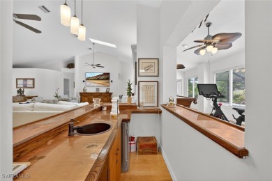 This stunning 3-bedroom, 3-bath residence den or bonus room on Fiddlesticks Country Club in Florida - for sale on GolfHomes.com, golf home, golf lot