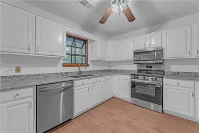 Move-in ready in beautiful Bella Vista! Perfectly situated on Bella Vista Country Club and Golf Course in Arkansas - for sale on GolfHomes.com, golf home, golf lot