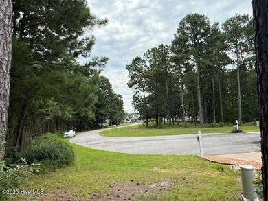 Discover the perfect setting for your dream home on this on Sound Golf Links at Albemarle Plantation in North Carolina - for sale on GolfHomes.com, golf home, golf lot