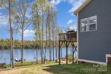 Breathtaking lakefront views from nearly every room in this on Edgewater Golf Club in South Carolina - for sale on GolfHomes.com, golf home, golf lot