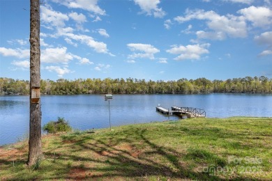 Breathtaking lakefront views from nearly every room in this on Edgewater Golf Club in South Carolina - for sale on GolfHomes.com, golf home, golf lot