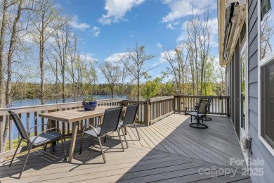 Breathtaking lakefront views from nearly every room in this on Edgewater Golf Club in South Carolina - for sale on GolfHomes.com, golf home, golf lot