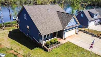 Breathtaking lakefront views from nearly every room in this on Edgewater Golf Club in South Carolina - for sale on GolfHomes.com, golf home, golf lot
