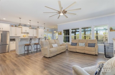 Breathtaking lakefront views from nearly every room in this on Edgewater Golf Club in South Carolina - for sale on GolfHomes.com, golf home, golf lot