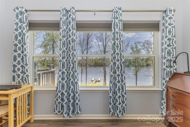 Breathtaking lakefront views from nearly every room in this on Edgewater Golf Club in South Carolina - for sale on GolfHomes.com, golf home, golf lot