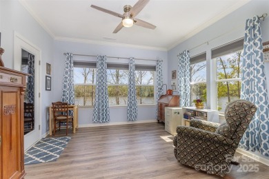 Breathtaking lakefront views from nearly every room in this on Edgewater Golf Club in South Carolina - for sale on GolfHomes.com, golf home, golf lot