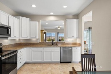 This gorgeous, move-in ready home is situated on an elevated on Conestoga Golf Club in Nevada - for sale on GolfHomes.com, golf home, golf lot