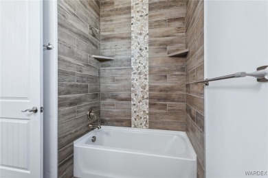 Welcome to this stunning brand-new construction home, perfectly on Los Lagos Golf Club in Arizona - for sale on GolfHomes.com, golf home, golf lot