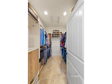 This gorgeous, move-in ready home is situated on an elevated on Conestoga Golf Club in Nevada - for sale on GolfHomes.com, golf home, golf lot