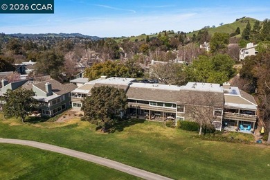 Located in desirable lagoon entry E1 this lower level Sierra on Rossmoor Golf Course in California - for sale on GolfHomes.com, golf home, golf lot