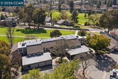 Located in desirable lagoon entry E1 this lower level Sierra on Rossmoor Golf Course in California - for sale on GolfHomes.com, golf home, golf lot