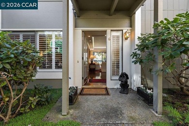 Located in desirable lagoon entry E1 this lower level Sierra on Rossmoor Golf Course in California - for sale on GolfHomes.com, golf home, golf lot