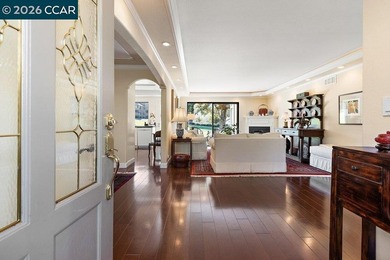 Located in desirable lagoon entry E1 this lower level Sierra on Rossmoor Golf Course in California - for sale on GolfHomes.com, golf home, golf lot