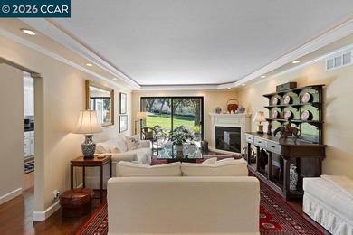 Located in desirable lagoon entry E1 this lower level Sierra on Rossmoor Golf Course in California - for sale on GolfHomes.com, golf home, golf lot