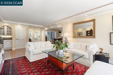 Located in desirable lagoon entry E1 this lower level Sierra on Rossmoor Golf Course in California - for sale on GolfHomes.com, golf home, golf lot