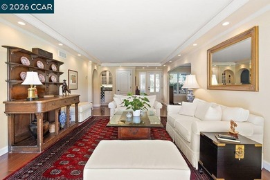 Located in desirable lagoon entry E1 this lower level Sierra on Rossmoor Golf Course in California - for sale on GolfHomes.com, golf home, golf lot