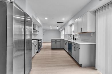 BEAUTIFULLY REMODELED GRAMERCY IN DESIRABLE STRATHMORE on Buffalo Grove Golf Club in Illinois - for sale on GolfHomes.com, golf home, golf lot