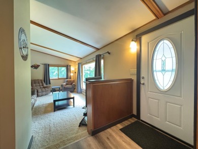 Located in the BRINKLAND neighborhood, this 3BD/2.5BA ranch home on Minocqua Country Club in Wisconsin - for sale on GolfHomes.com, golf home, golf lot